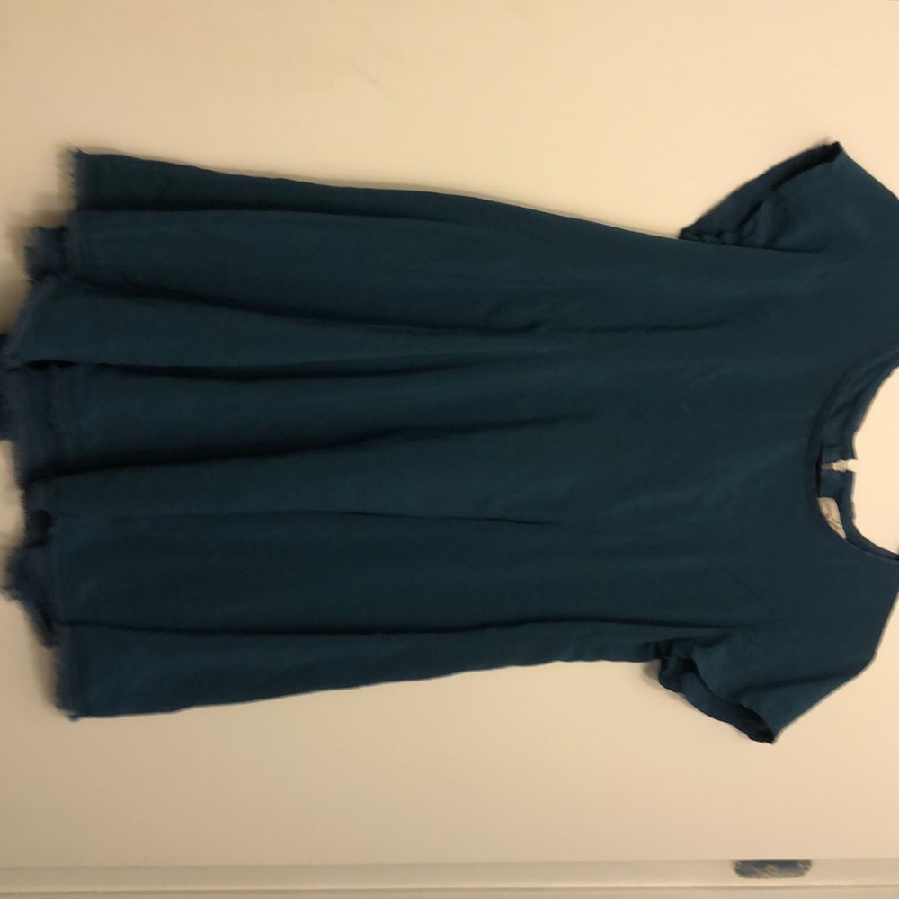 Turquoise flowy mini dress is perfect condition!
